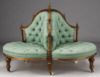Furniture : English, AN ENGLISH VICTORIAN WALNUT ROUNDABOUT CONVERSATION CHAIR. Late19th Century. 37 x 52 inches (94.0 x 132.1 cm). ...