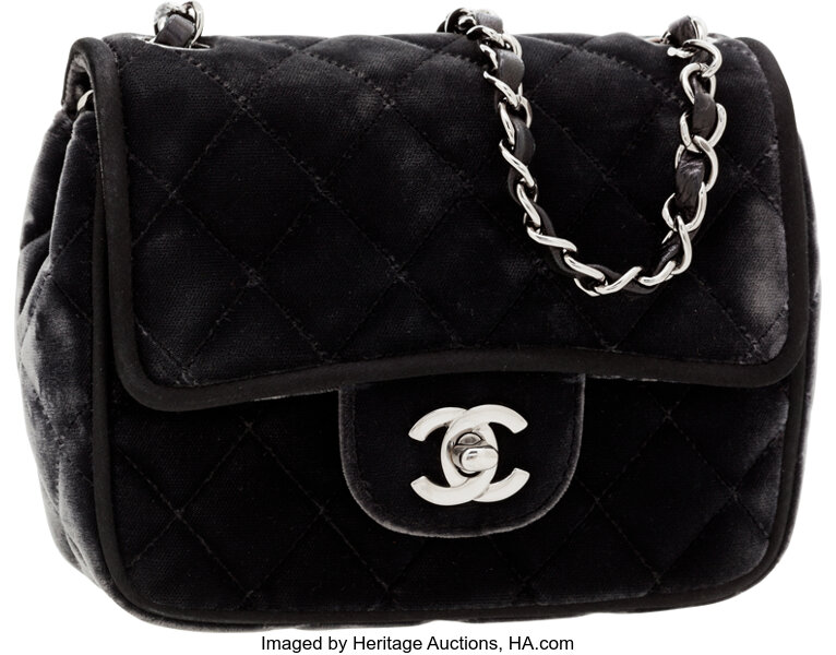 Sold at Auction: A MINI FUR BAG BY CHANEL