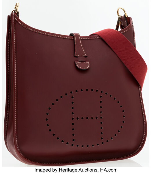 Sold at Auction: HERMES EVELYNE RED SHOULDER BAG