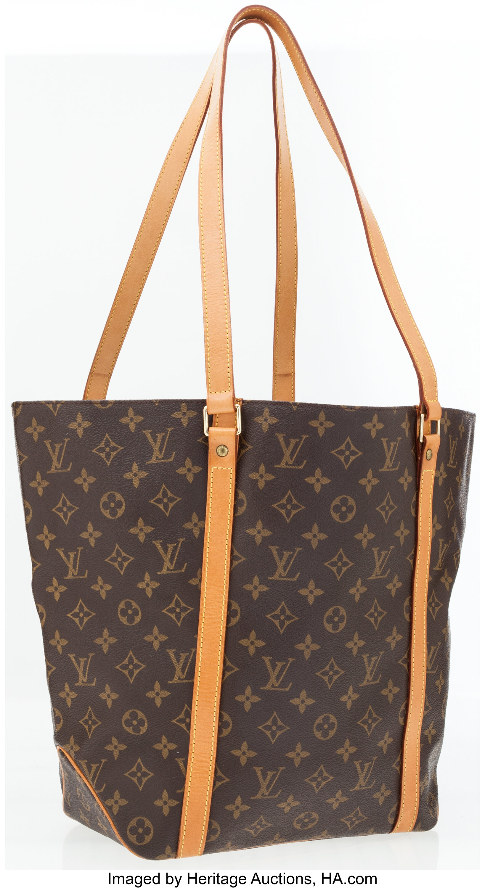 Sold at Auction: A Louis Vuitton leather and monogram canvas Sac