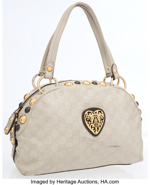 Gucci embossed bag  Sterling & Knight Jewelry & Pawn