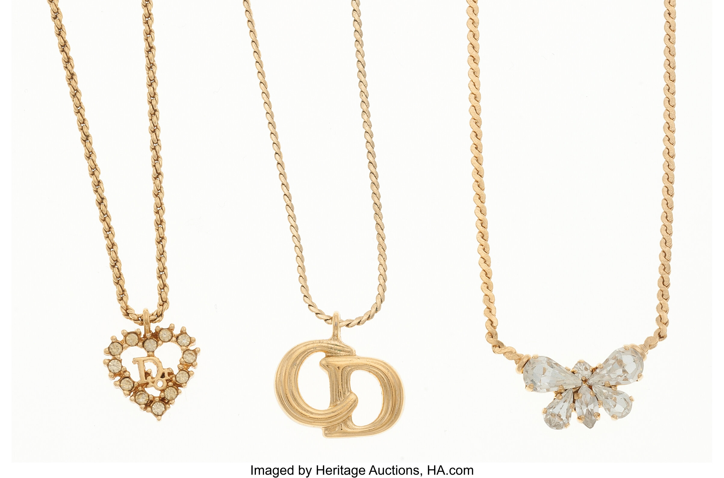 Christian Dior Set of Three: Gold Tone Metal Heart Necklace with