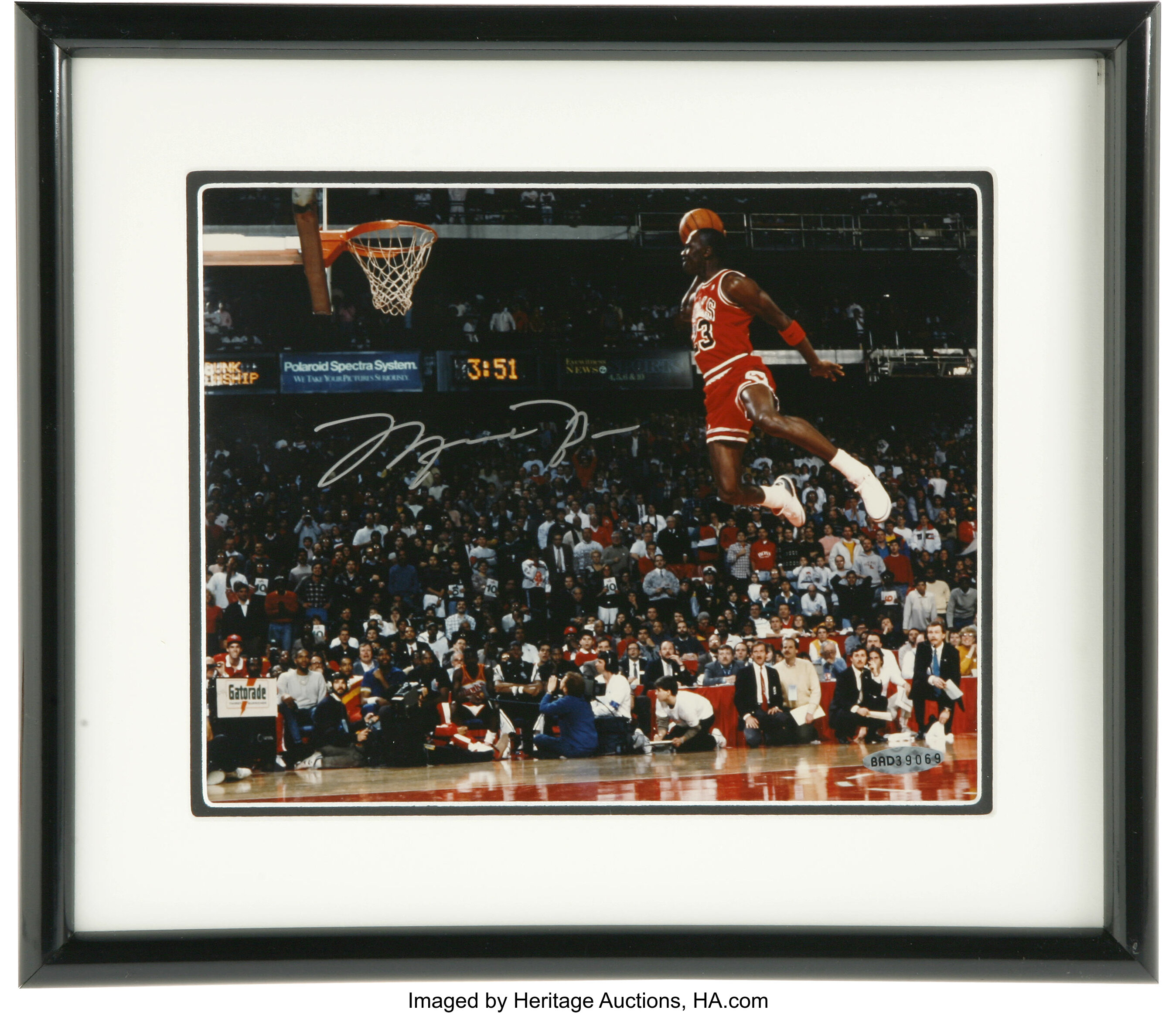 Michael Jordan Reverse Dunk” Framed Photograph (Engraved Series