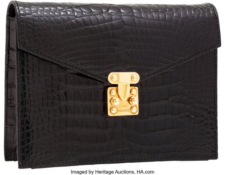 Sold at Auction: A ladies wallet marked Louis Vuitton