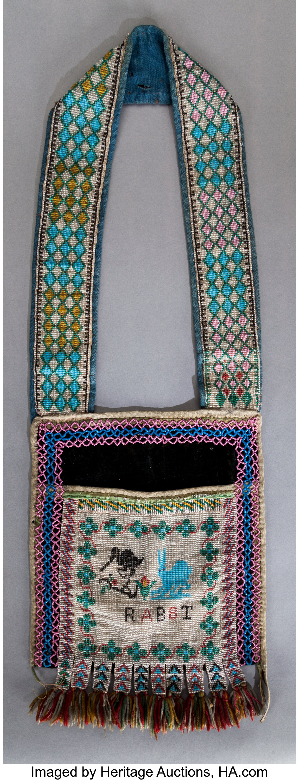 A CHIPPEWA CHILD'S PICTORIAL LOOM-BEADED BANDOLIER BAG. c. 1880 ...