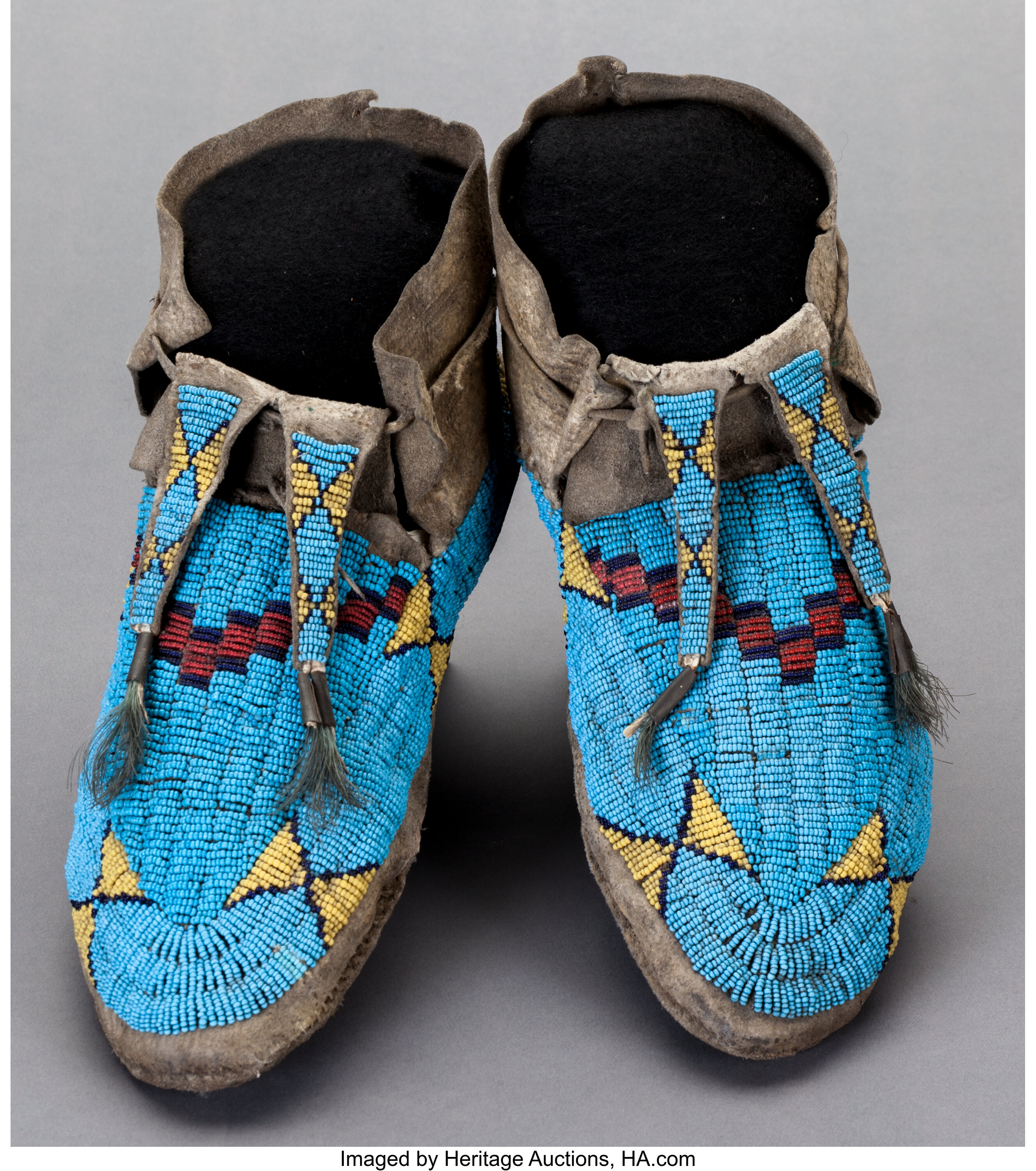 A PAIR OF SIOUX BEADED HIDE MOCCASINS. c. 1880... Other | Lot #54154 ...