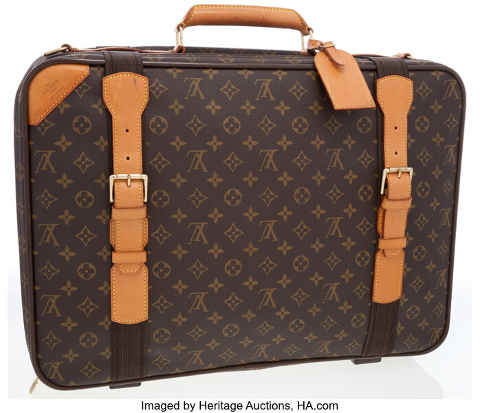 Louis Vuitton travel bag with shoulder strap in black canvas and