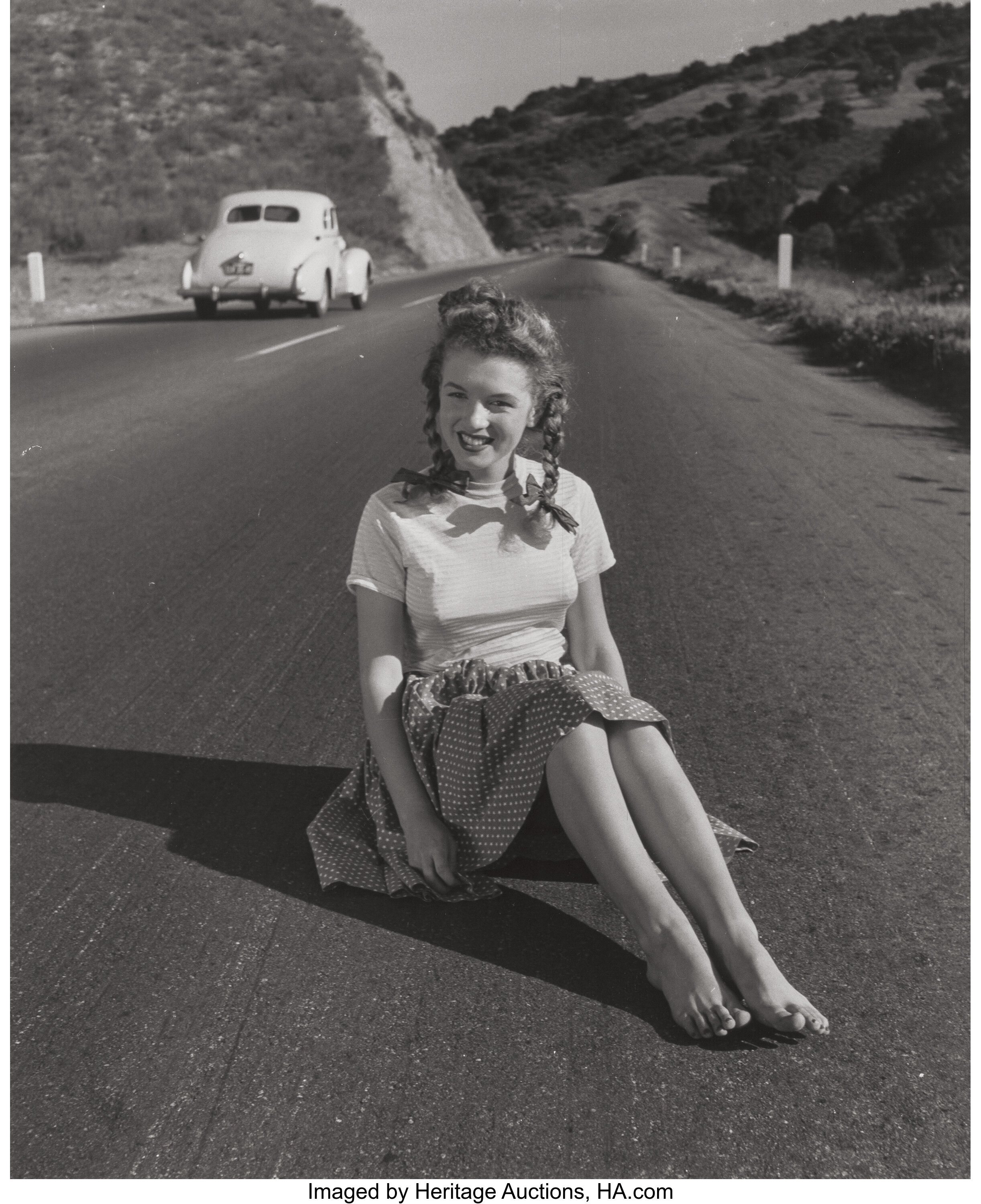 ANDRE DE DIENES (American, 1913-1985). Marilyn Monroe, 1945. | Lot 