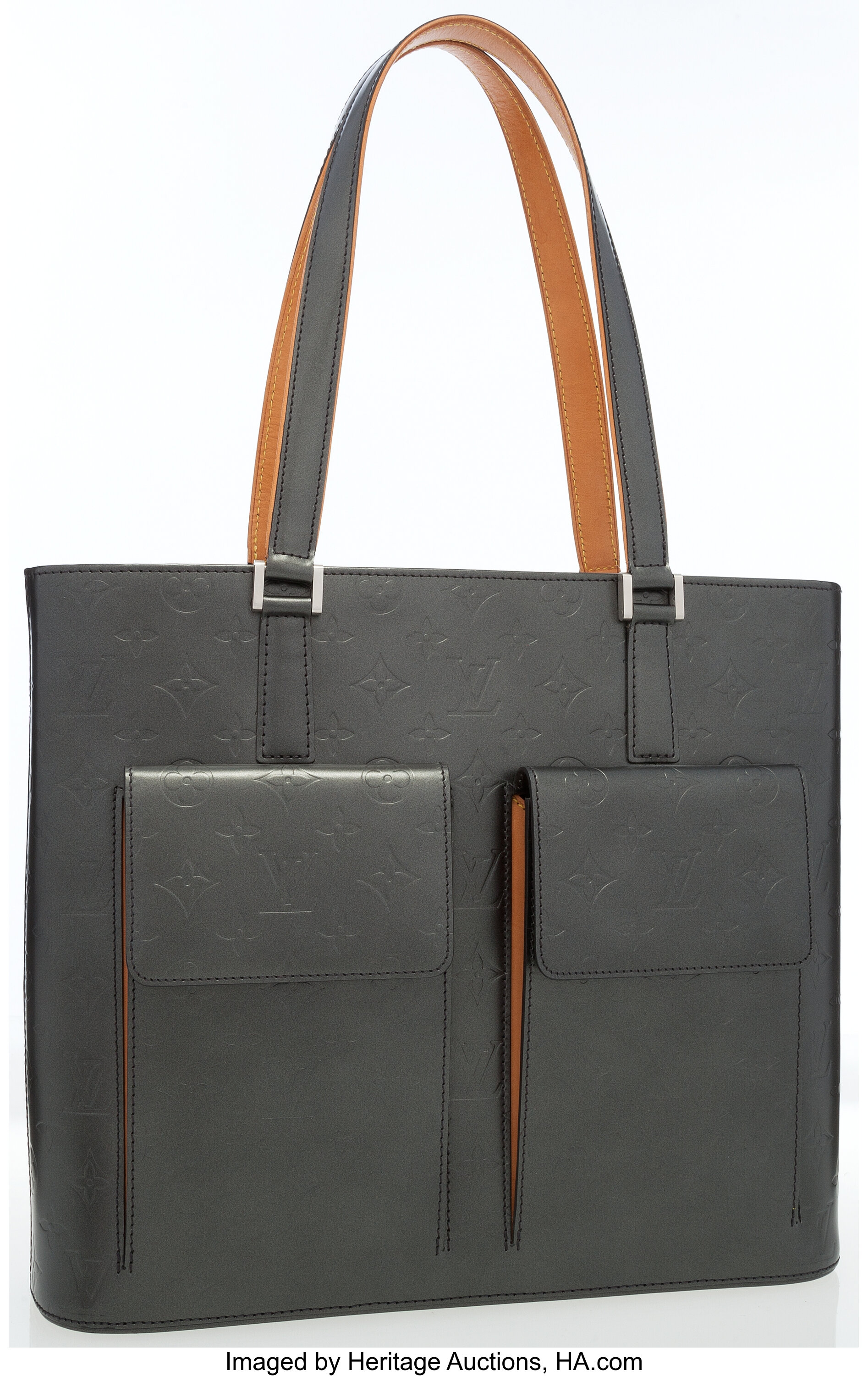 Sold at Auction: LOUIS VUITTON VINYL LOGO TOTE BAG. LEATHER TRIMME