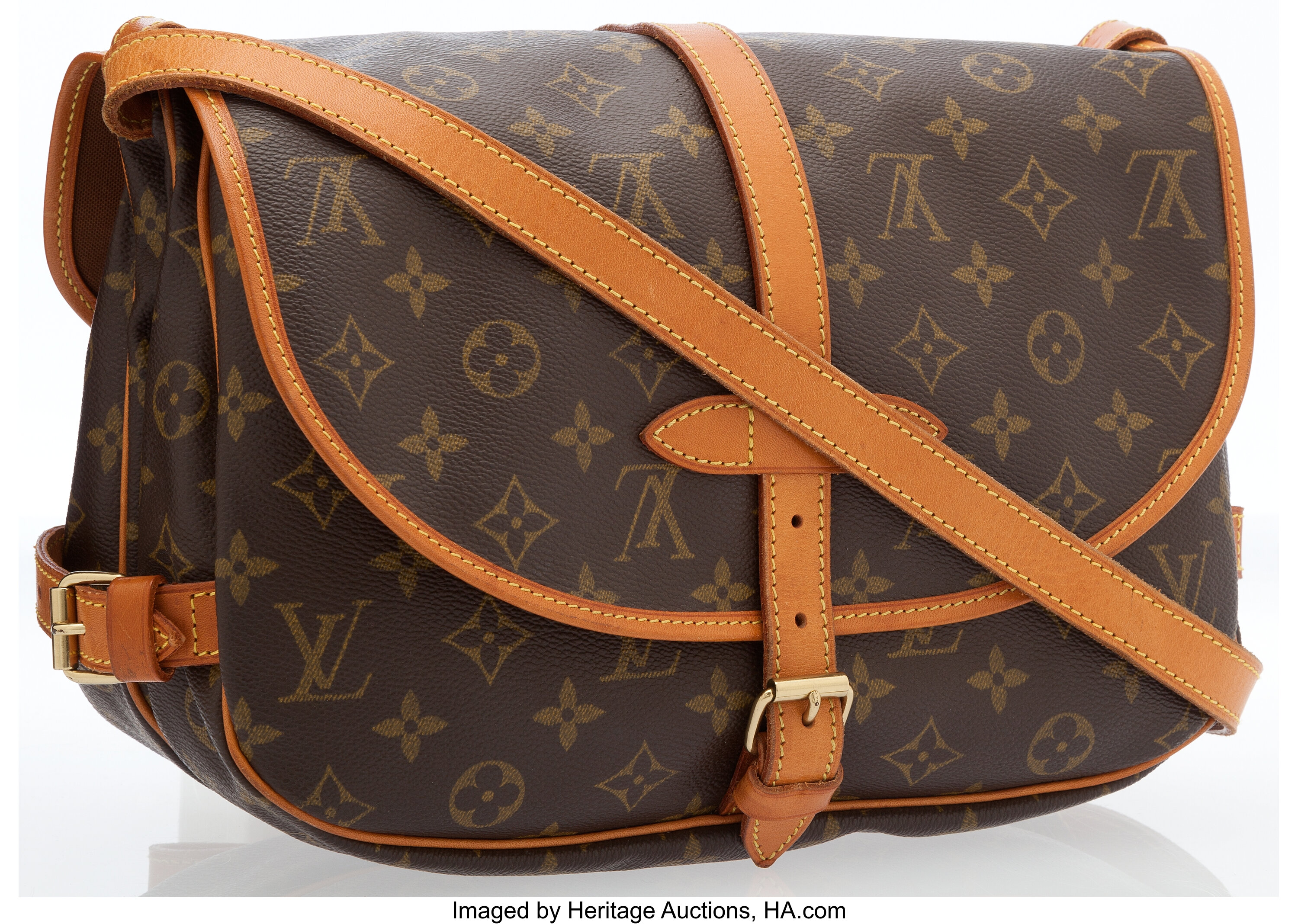 Sold at Auction: LOUIS VUITTON SAUMUR 25 IN BROWN MONOGRAM CANVAS