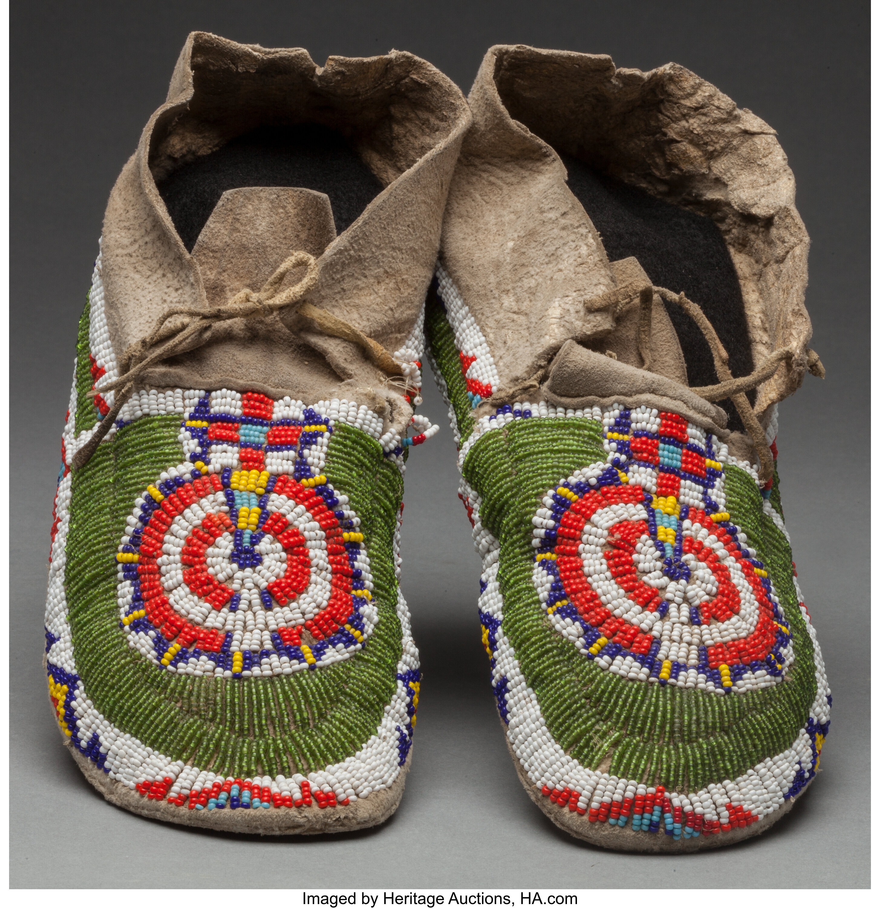 A PAIR OF CHEYENNE BEADED HIDE MOCCASINS. ... (Total: 2 Items) | Lot ...