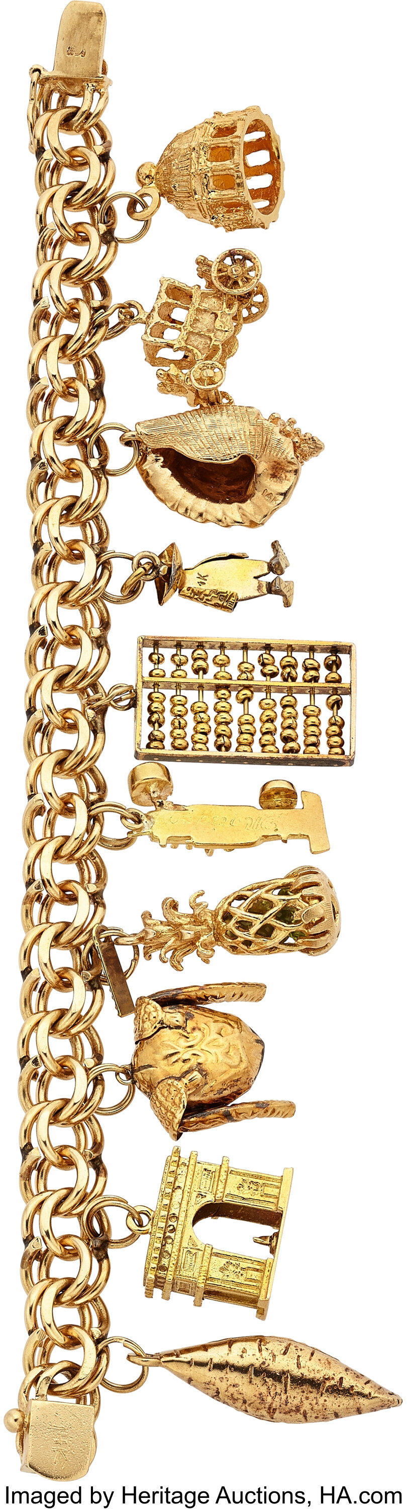 Gold Charm Bracelet.  Estate Jewelry Bracelets | Lot #54488 | Heritage Auctions