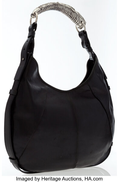 Sold at Auction: Yves Saint Laurent black leather Mombasa sling bag with  horn detail to shou