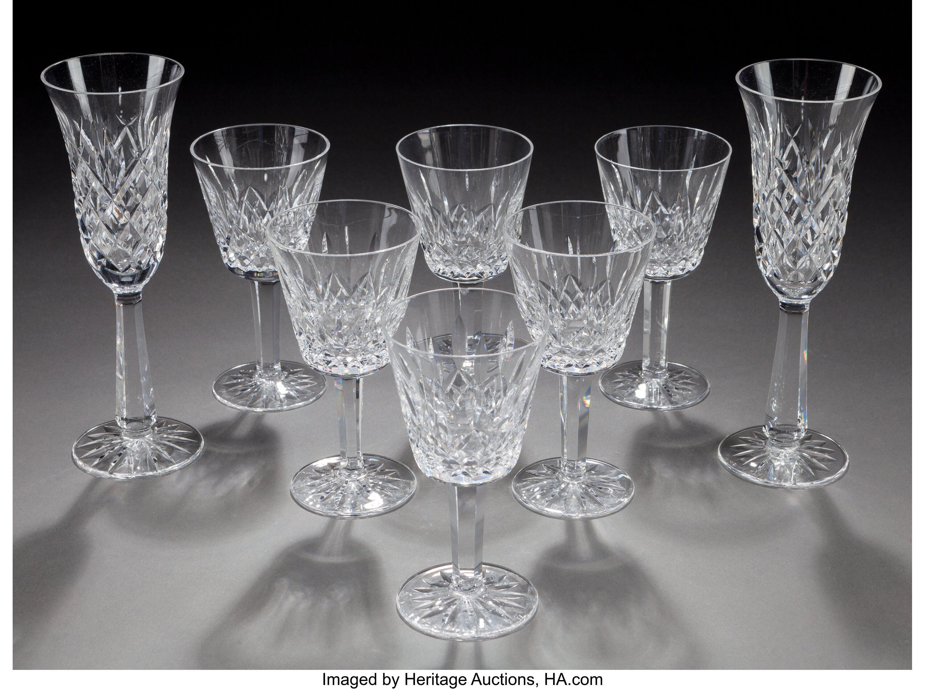 A Set Of Eight Waterford Lismore Pattern Champagne And Red Wine