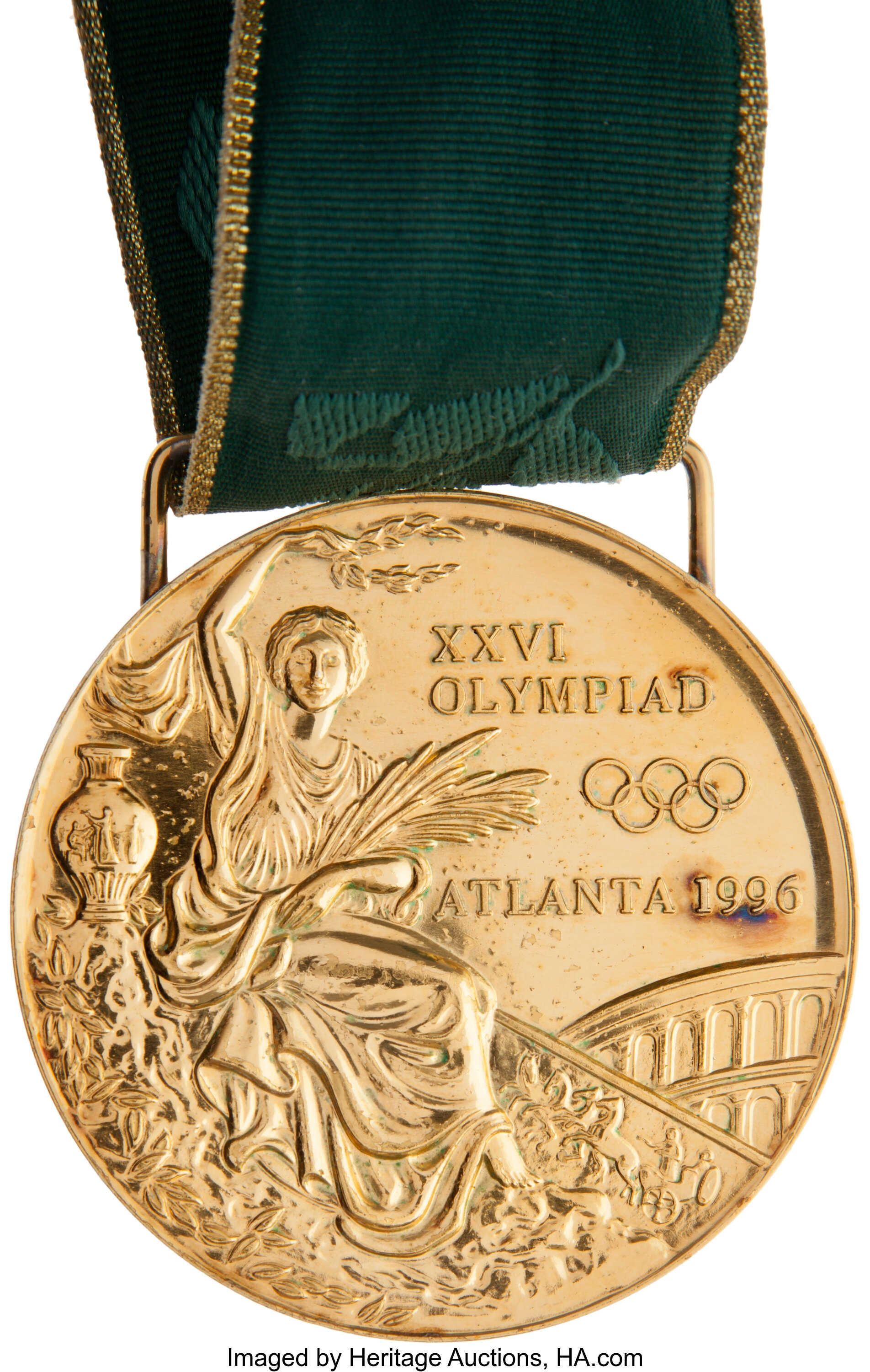 1996-atlanta-olympics-gold-medal-presented-to-american-swimmer-lot