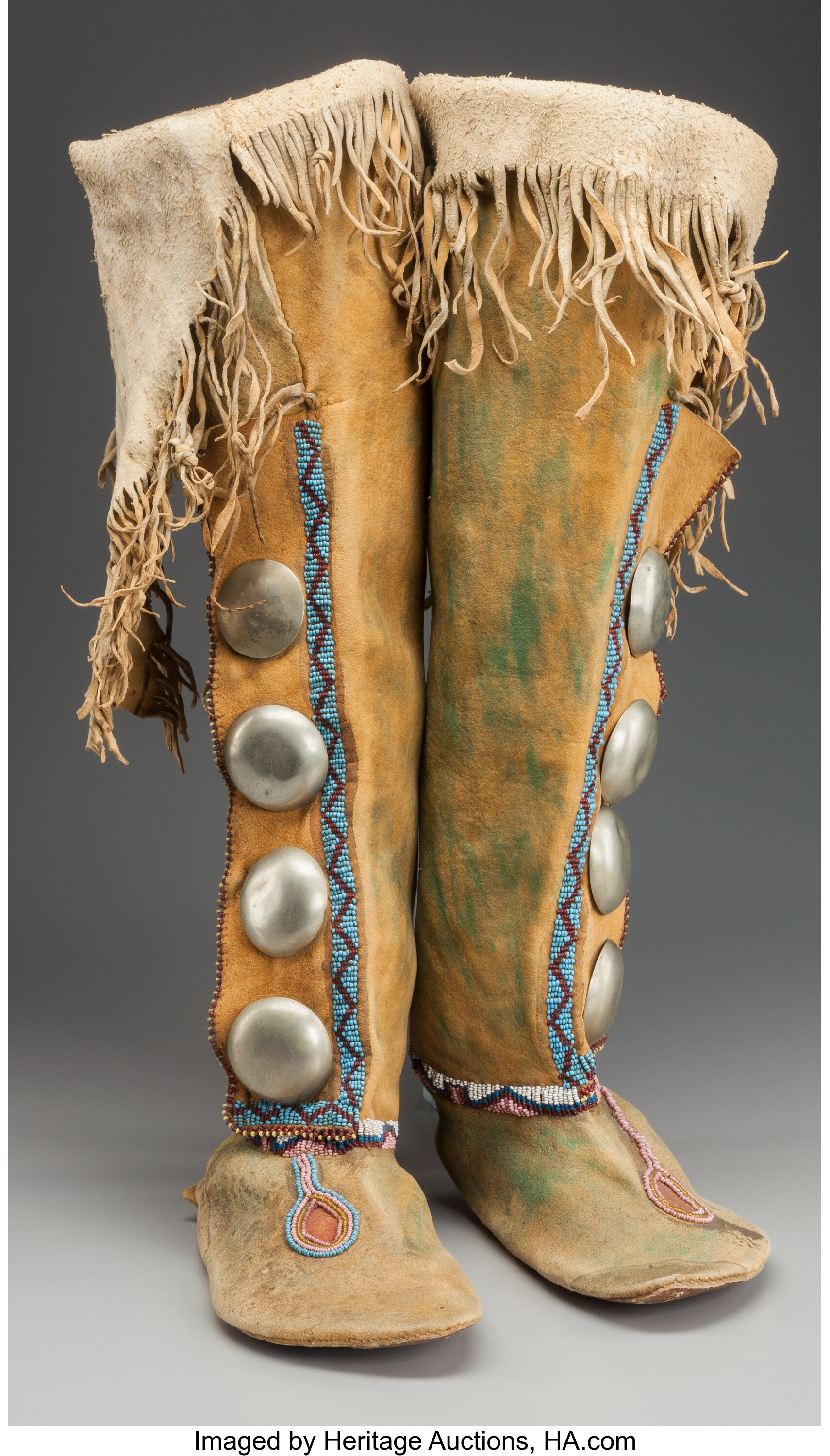 A PAIR OF KIOWA BEADED HIDE BOOT MOCCASINS. c. 1880... (Total: 2 | Lot ...