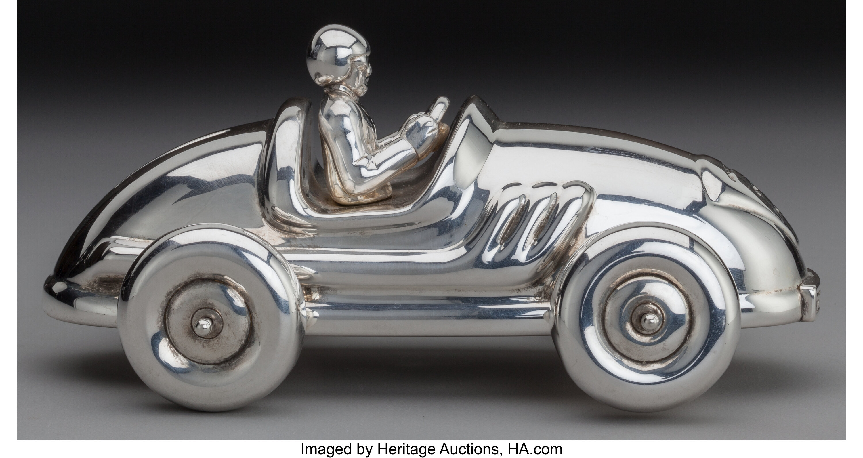 A TIFFANY & CO. SILVER RACE CAR PIGGY BANK, New York, New York