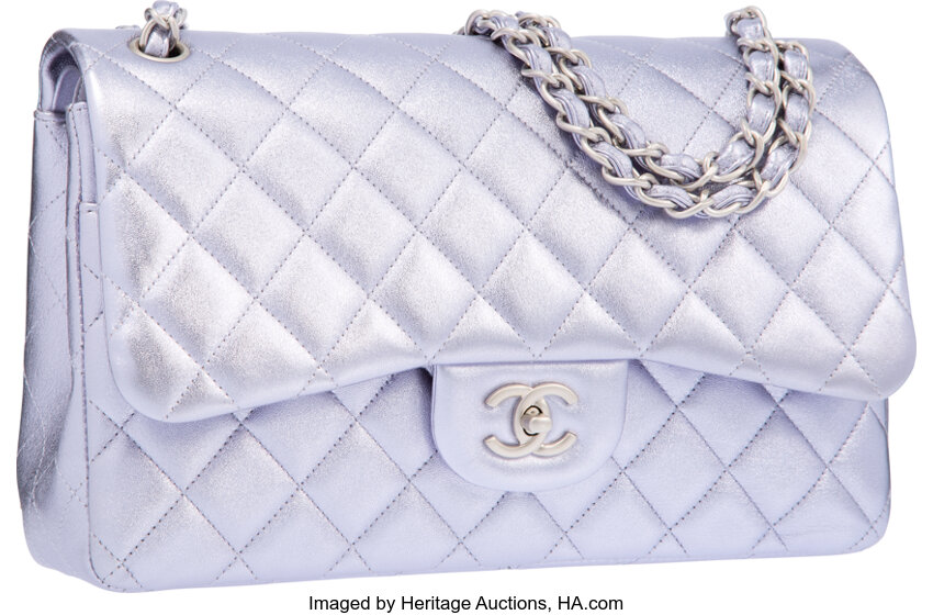 Sold at Auction: CHANEL, AN EXQUISITE JUMBO CHANEL PURPLE