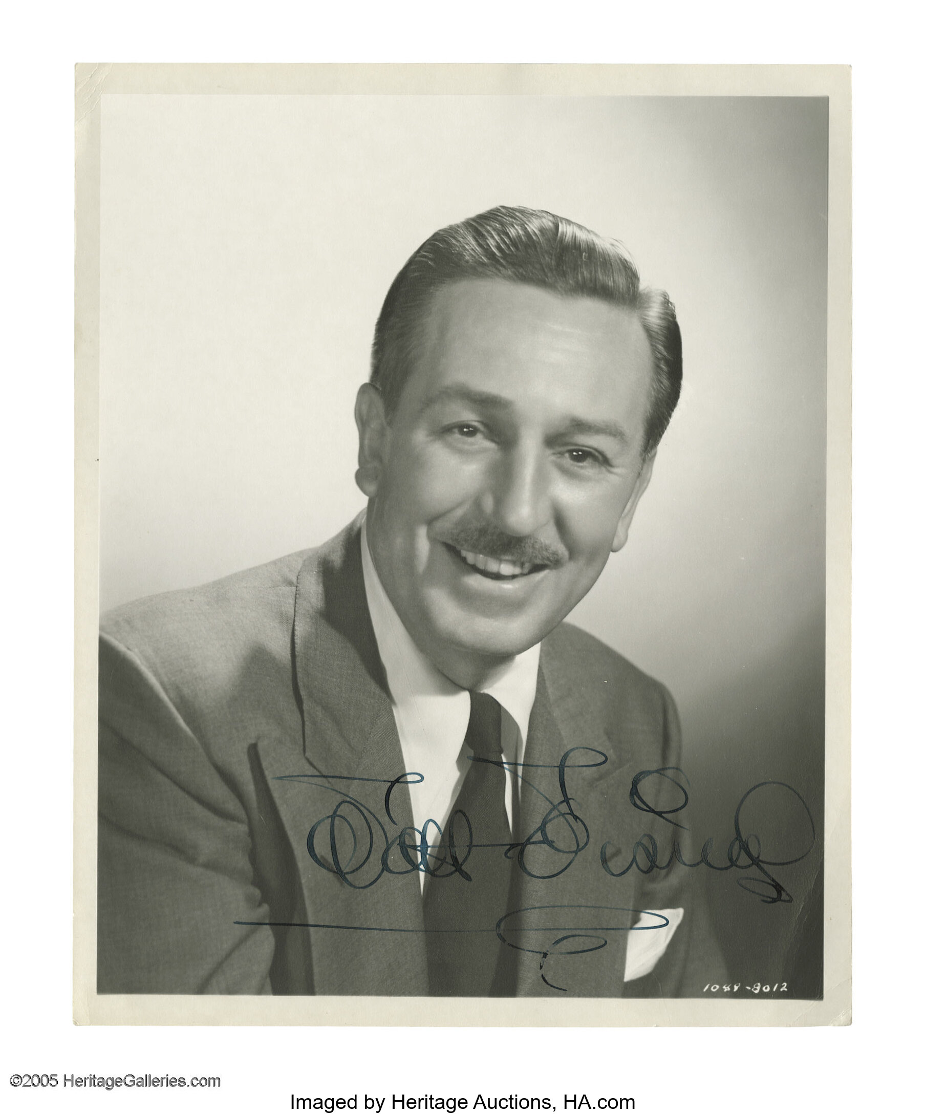 Walt Disney Signed Photo. Black and white, 8