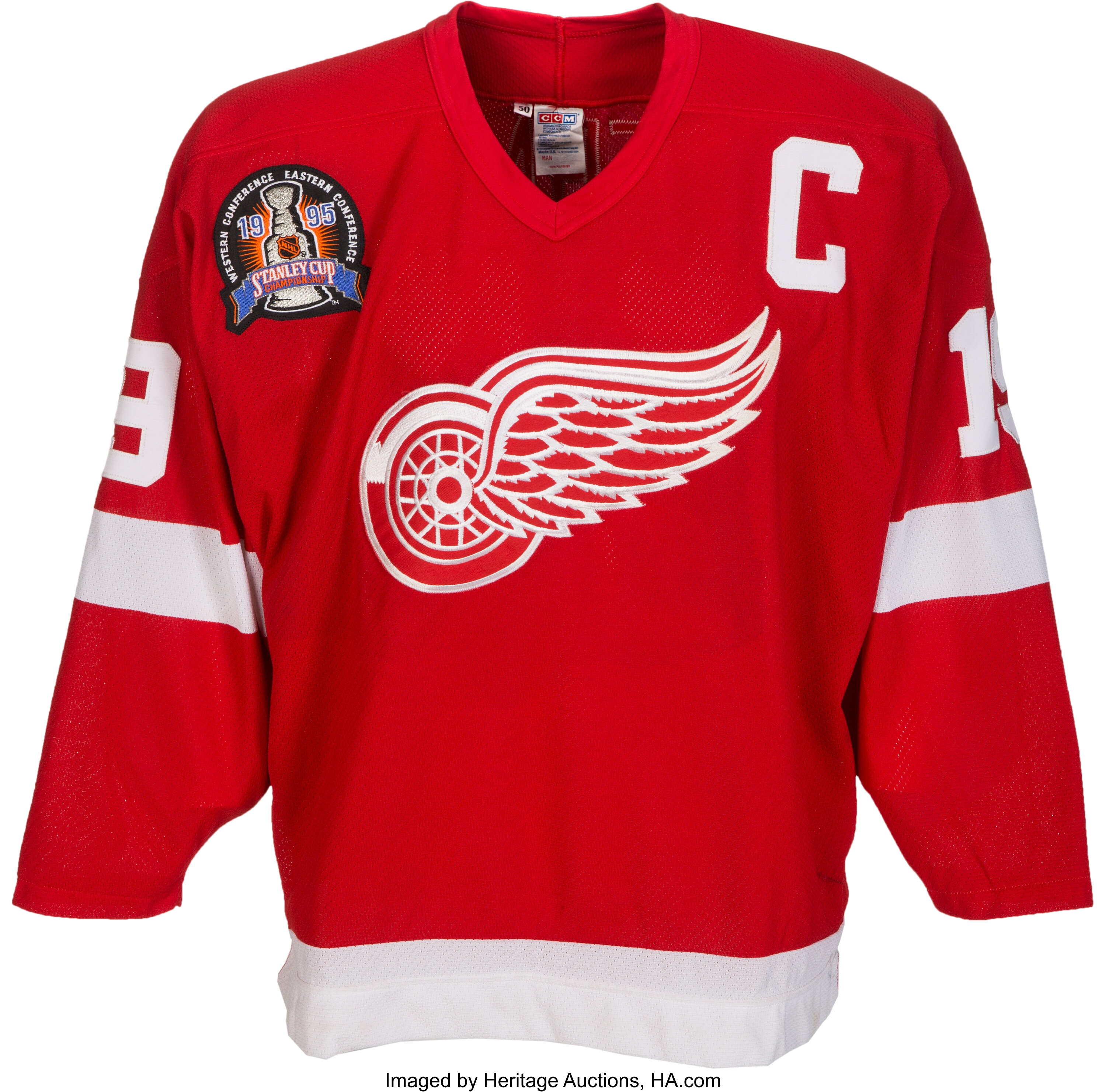 Spirit of Detroit wearing its very own Detroit RedWings Hockey jersey.