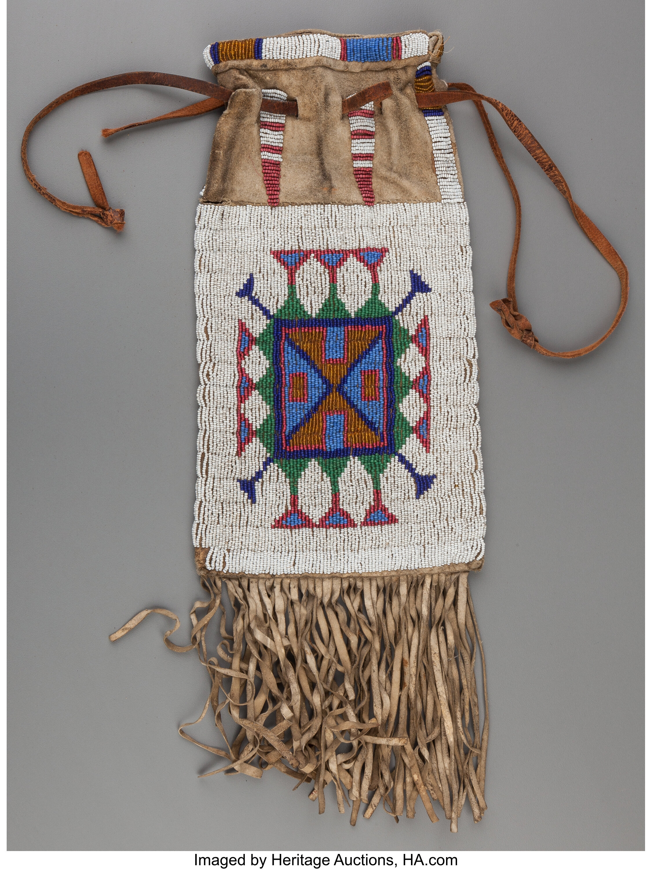 A Sioux Beaded Hide Tobacco Bag... Other | Lot #70597 | Heritage Auctions