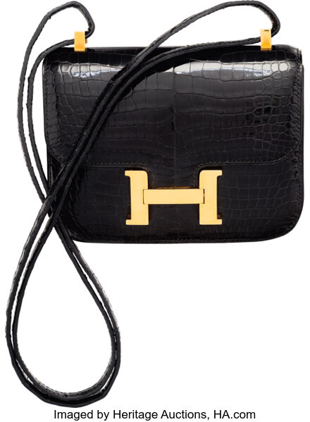 Hermès Vintage Shiny Black Porosus Crocodile Bag with Gold Hardware 28, 1940.