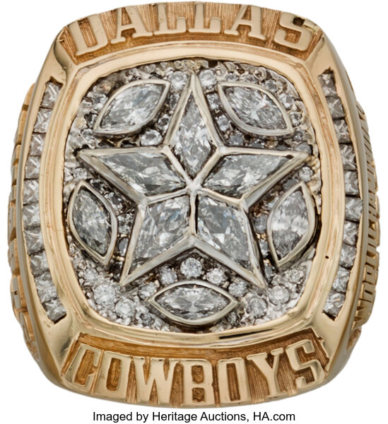 April 27, 2018: A Dallas Cowboys fan shows off 5 replica Super Bowl rings  for each of the Cowboys championship victories during the second round of  the 2018 NFL Draft at AT&T