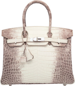 As a croc and diamond Birkin sells for £162,500, how Hermès' iconic design  became the most desired bag in the world