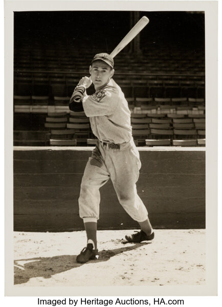 Wright Museum of World War II - This 1944 baseball card depicts Ted Williams  in his U.S. Navy uniform. Williams paused his playing career twice to serve  in the military, during both