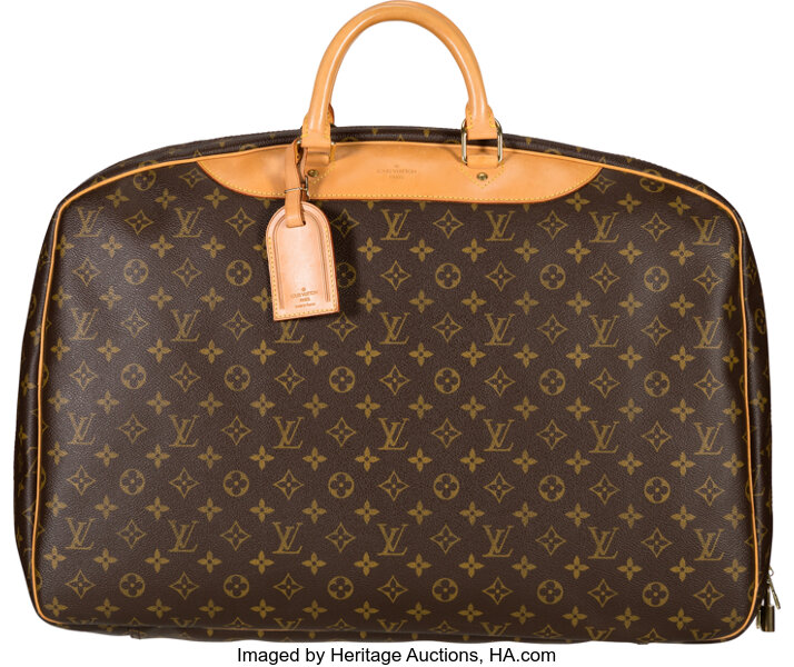 Sold at Auction: Louis Vuitton - a vintage Monogram zipped travel