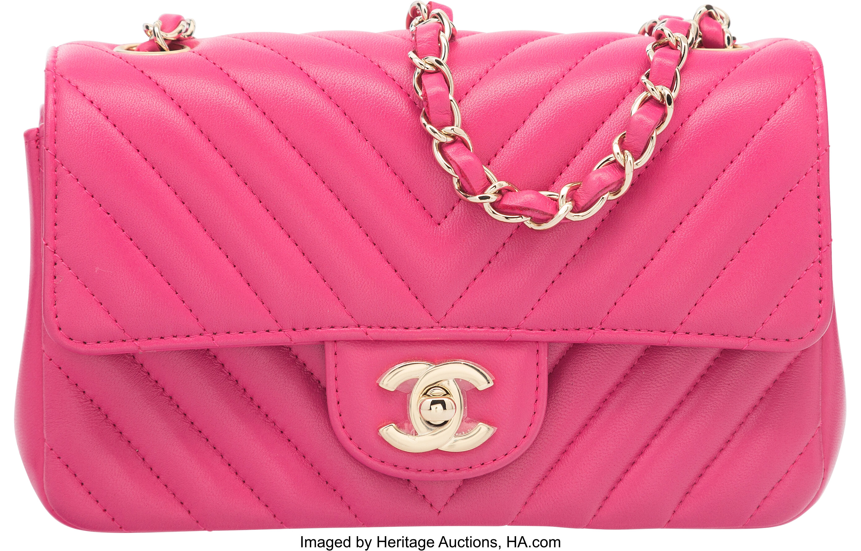 Chanel Pink Chevron Quilted Lambskin Leather Mini Flap Bag.