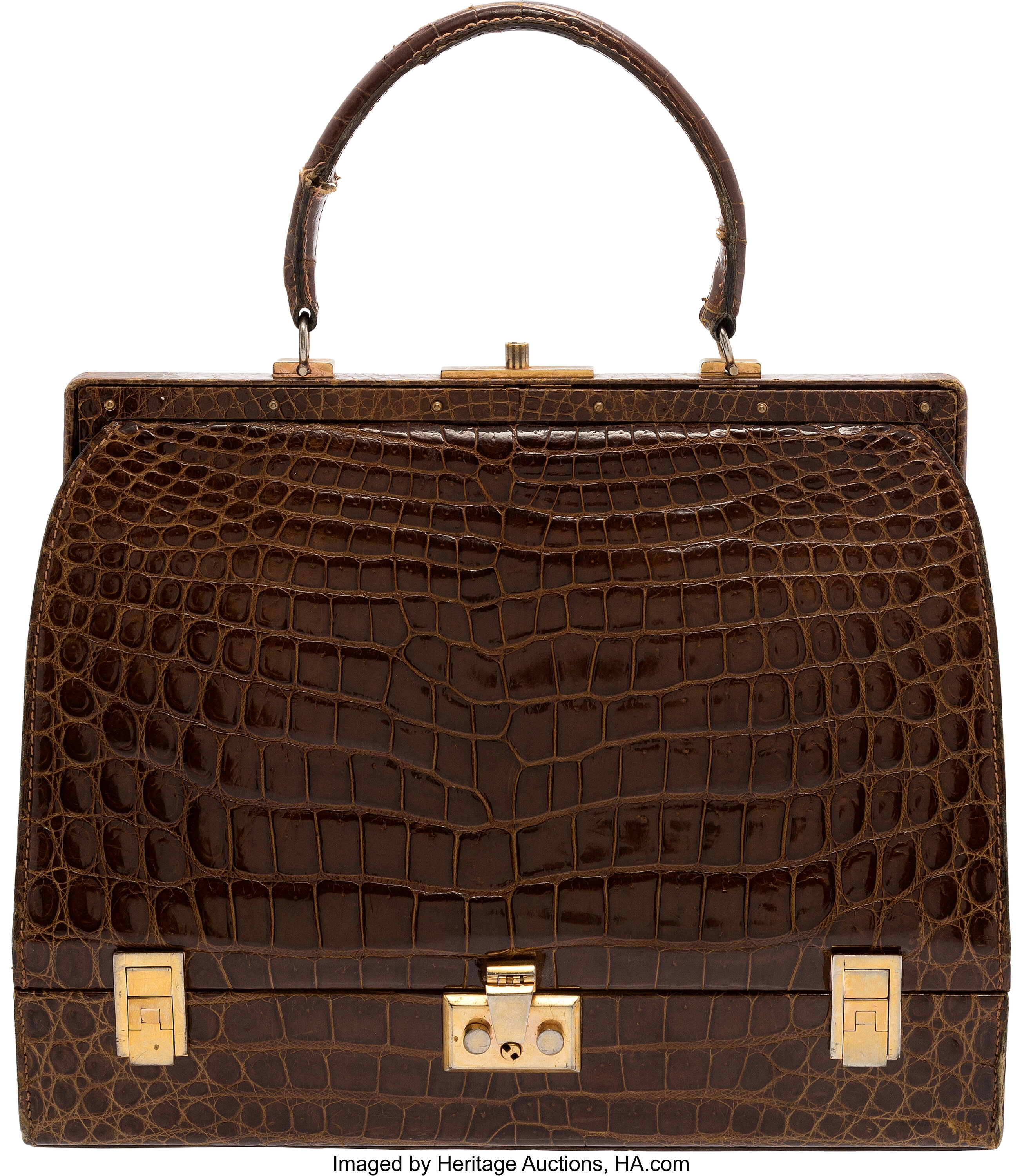 LOUIS FERAUD PARIS. A VINTAGE BROWN CROCODILE HANDBAG. Vintage