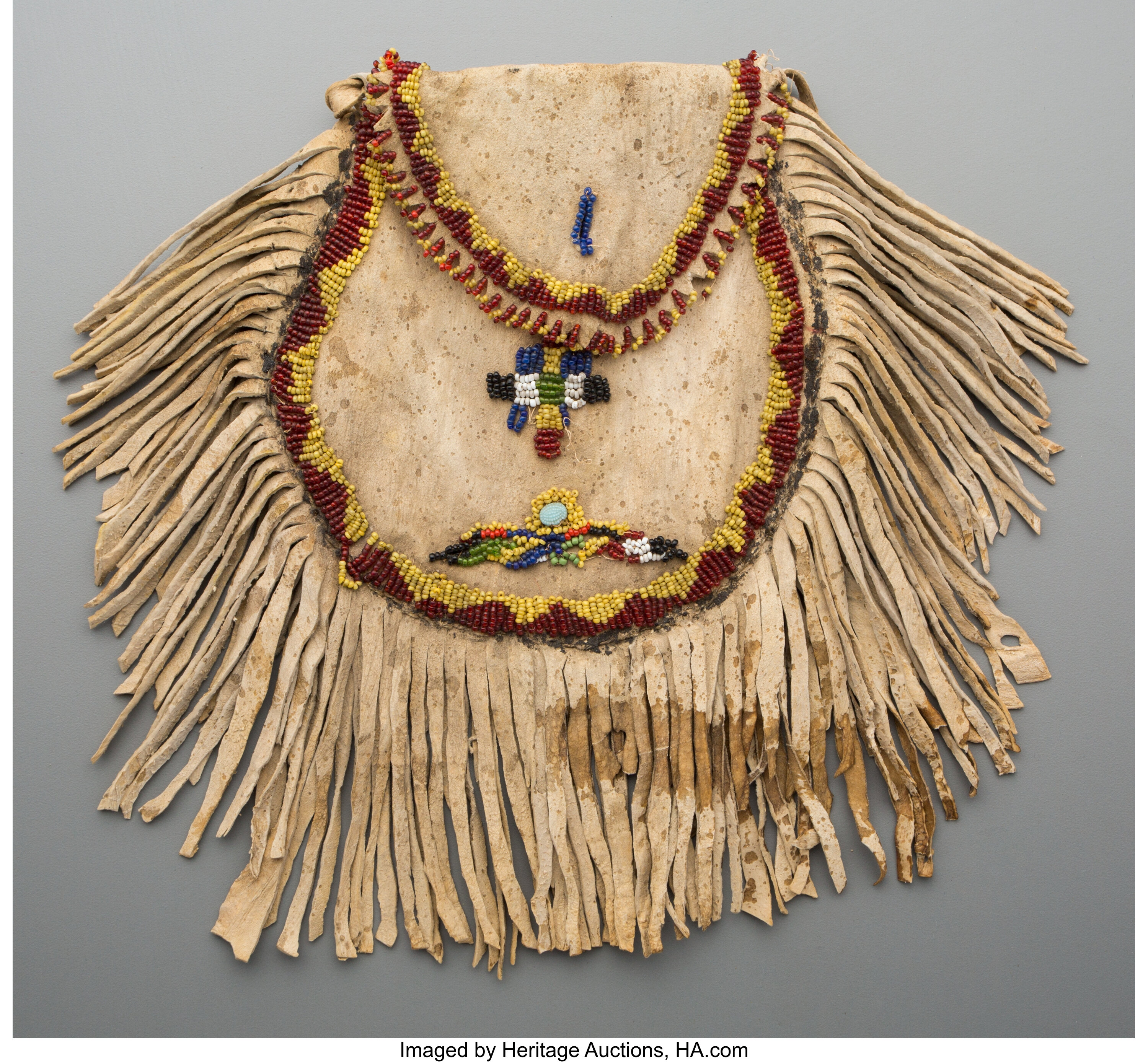An Apache Beaded and Fringed Hide Pouch... Other | Lot #70403 ...