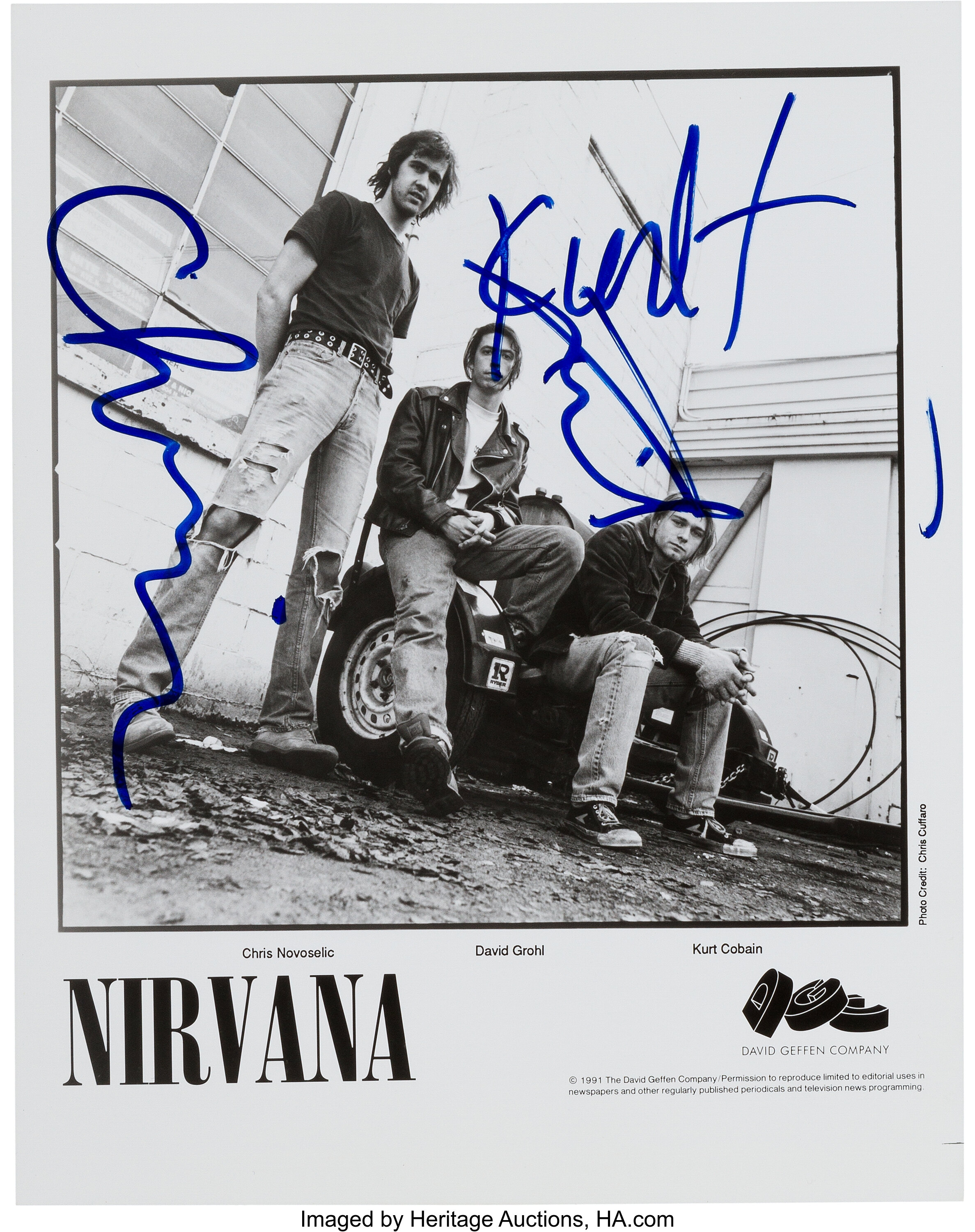 Circa 1991 Nirvana Multi-Signed Photograph with Kurt Cobain. | Lot