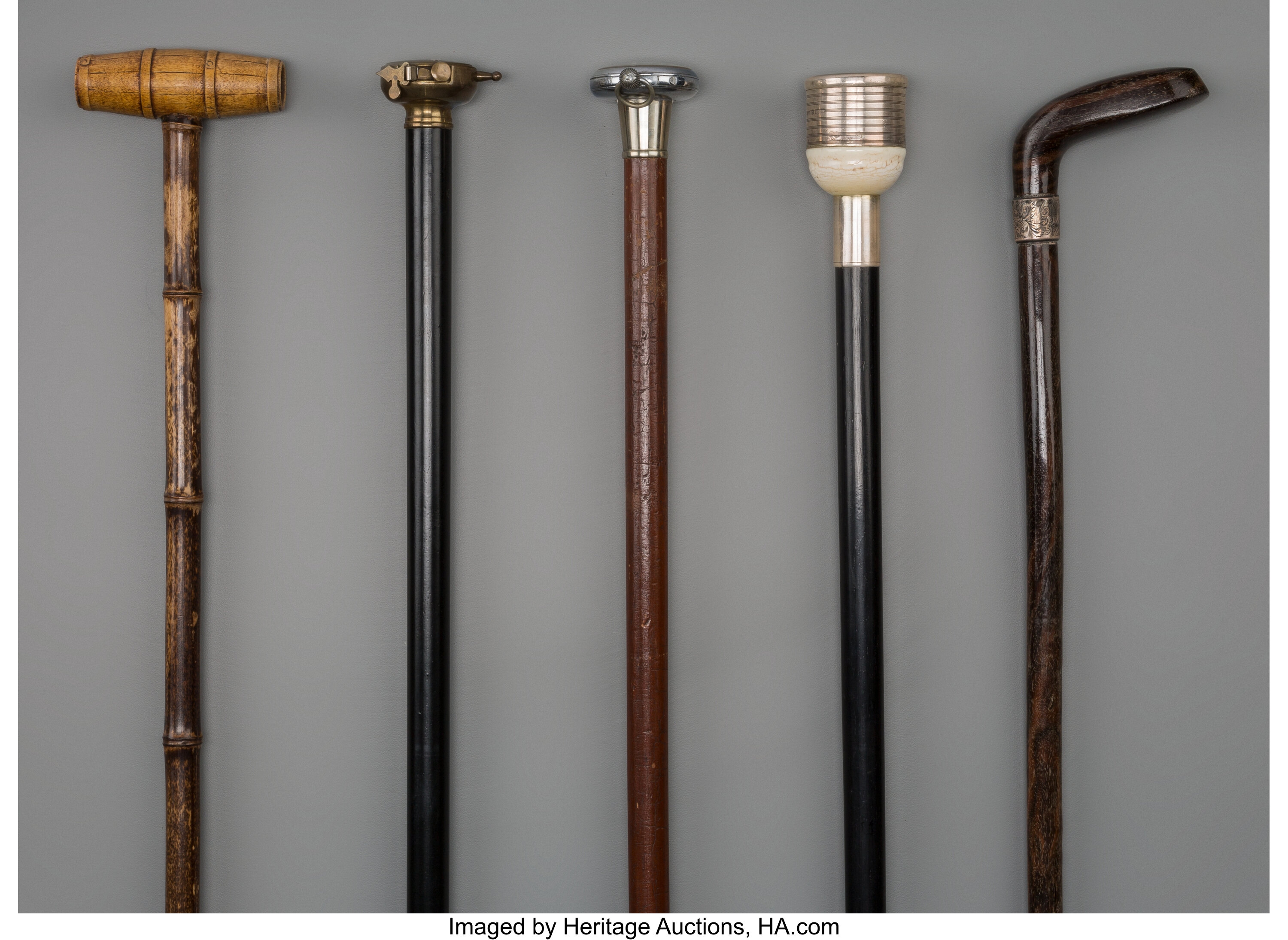 Five Sporting Lifestyle Walking Sticks, early 20th century. 37-1/4 ...