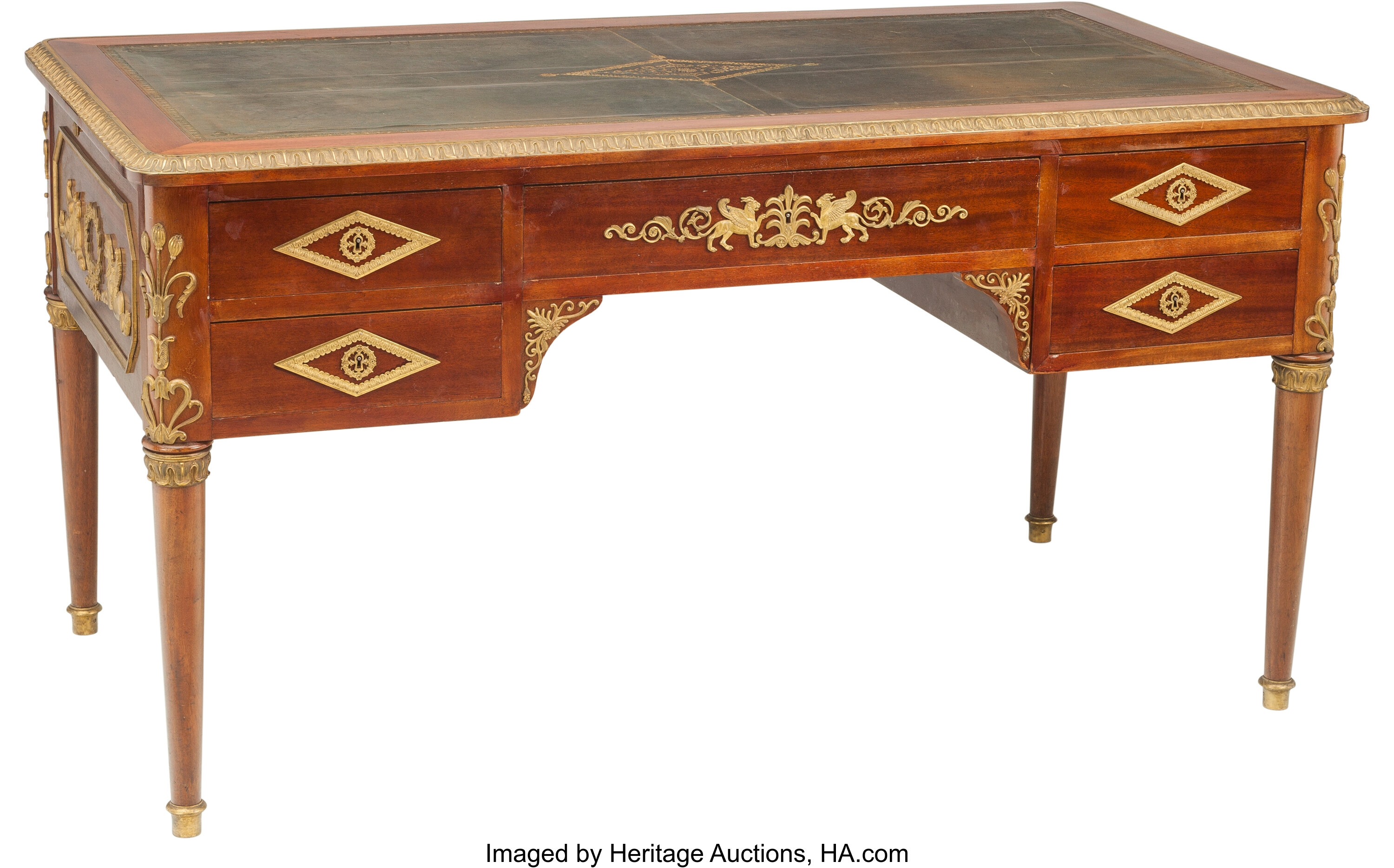 A French Second Empire Mahogany And Gilt Bronze Bureau Plat Circa