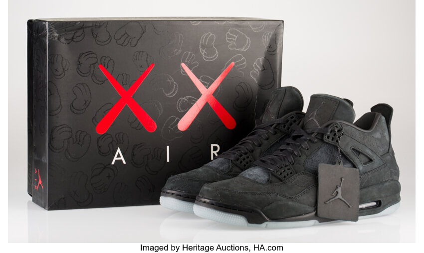 KAWS X Nike. Air Jordan 4 2017. Black sneakers with glow in the Lot 14046 Heritage Auctions