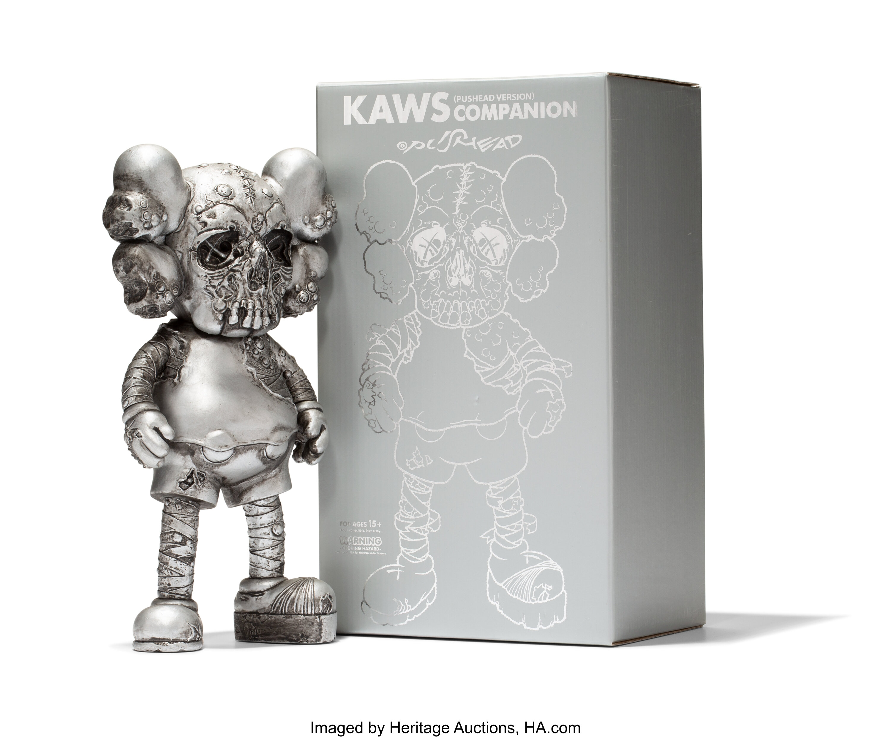 KAWS X Pushead. Companion (Silver), 2005. Painted cast vinyl