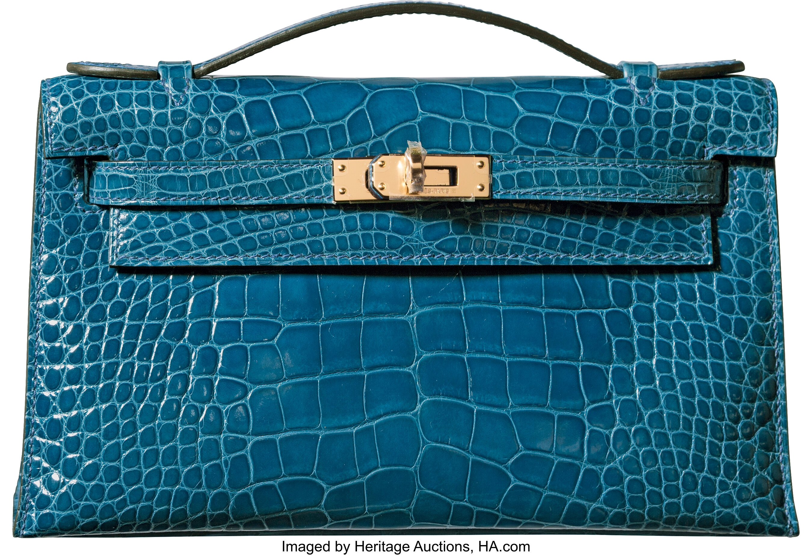 Sold at Auction: Hermes Shiny Niloticus Crocodile Kelly Pochette