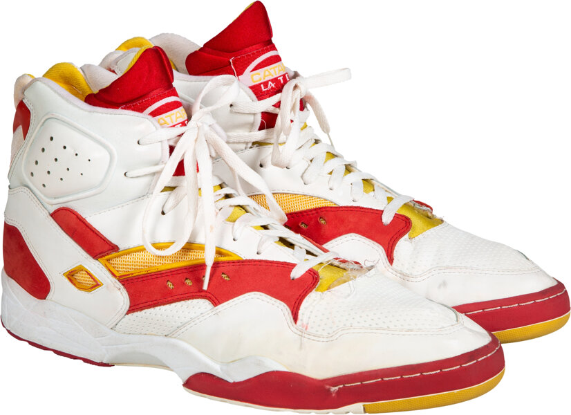 Hakeem Olajuwon would like to sell you some sneakers, please