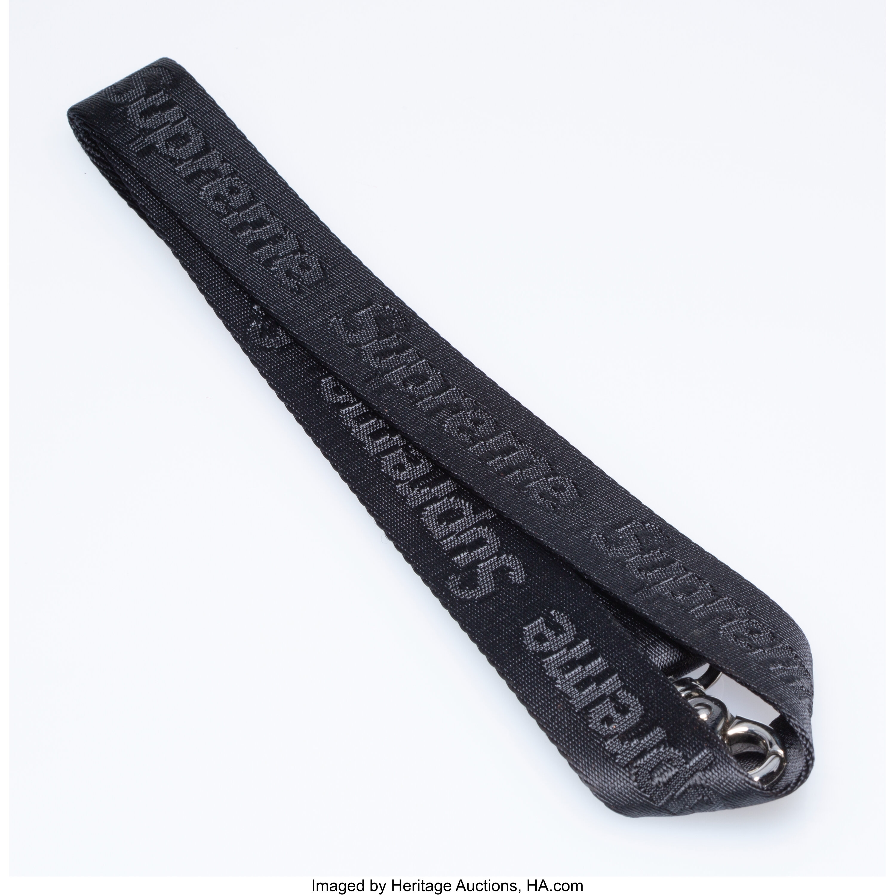 Source Black embossed supeme nylon neck lanyard with silver keyring on  m.