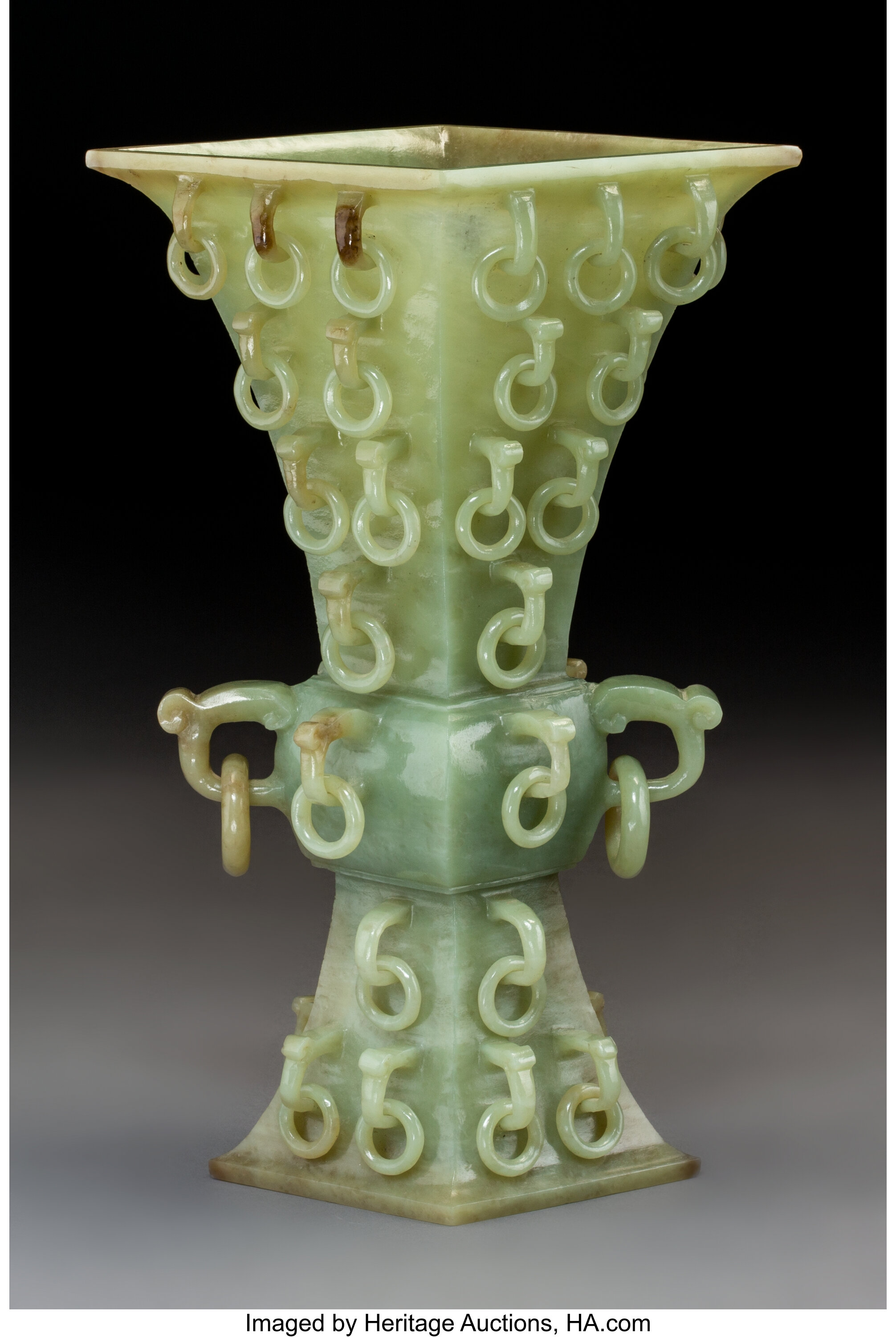 A Large Chinese Carved Yellow Jade Gu Vase With Freely Carved