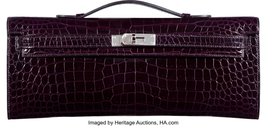 Shiny purple porosus crocodile and palladium hardware handbag