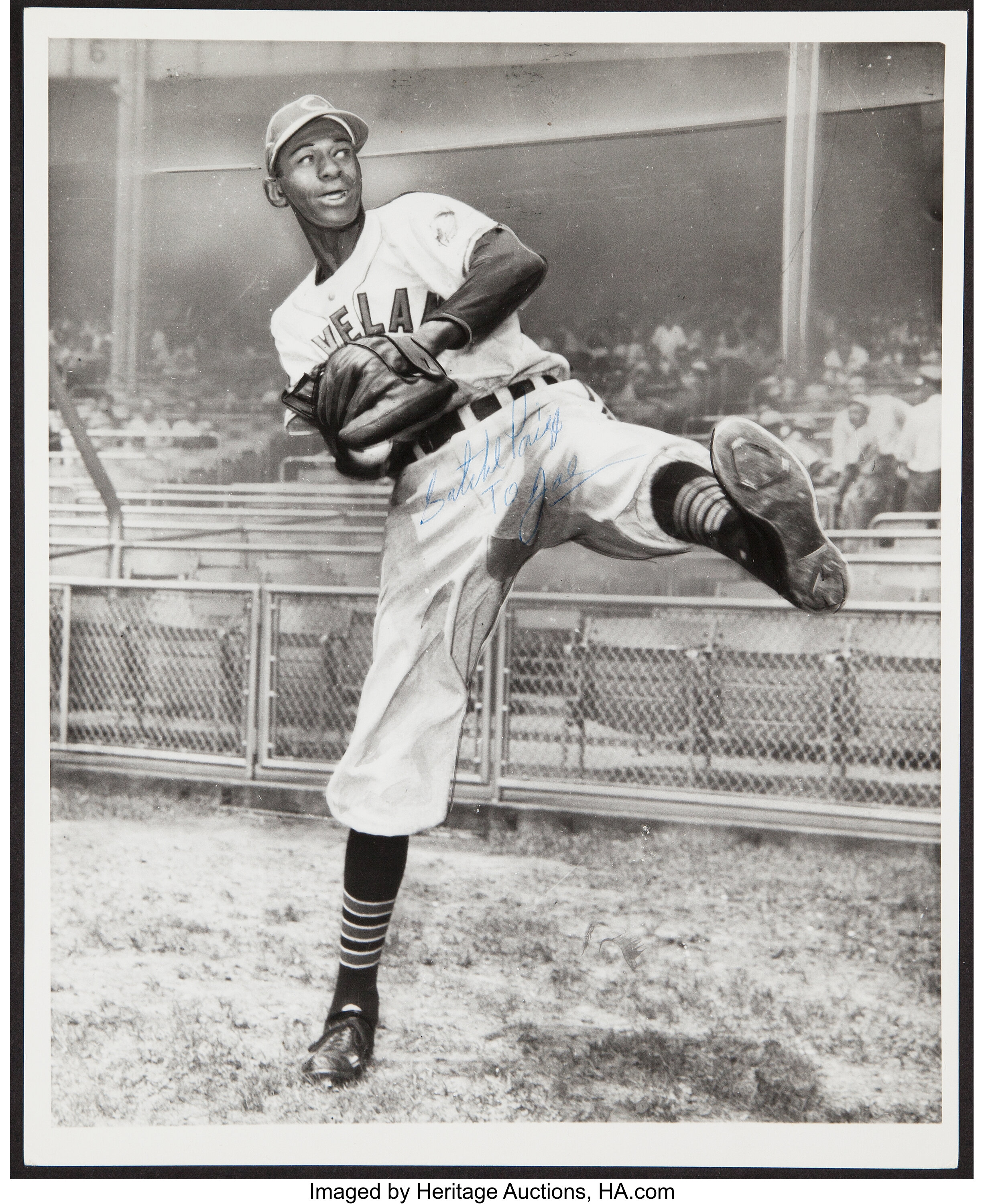 Satchel Paige signs with the Cleveland Indians