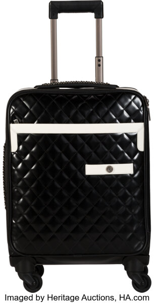 Chanel Black Quilted Leather Rolling Suitcase. Condition: 2. 14