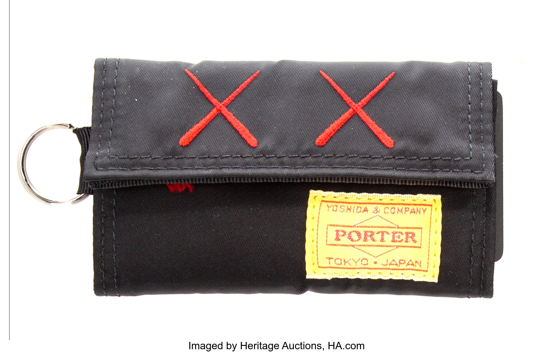 KAWS X Porter. Key Holder, c. 2008. Polyester key holder. 2-3/4 x