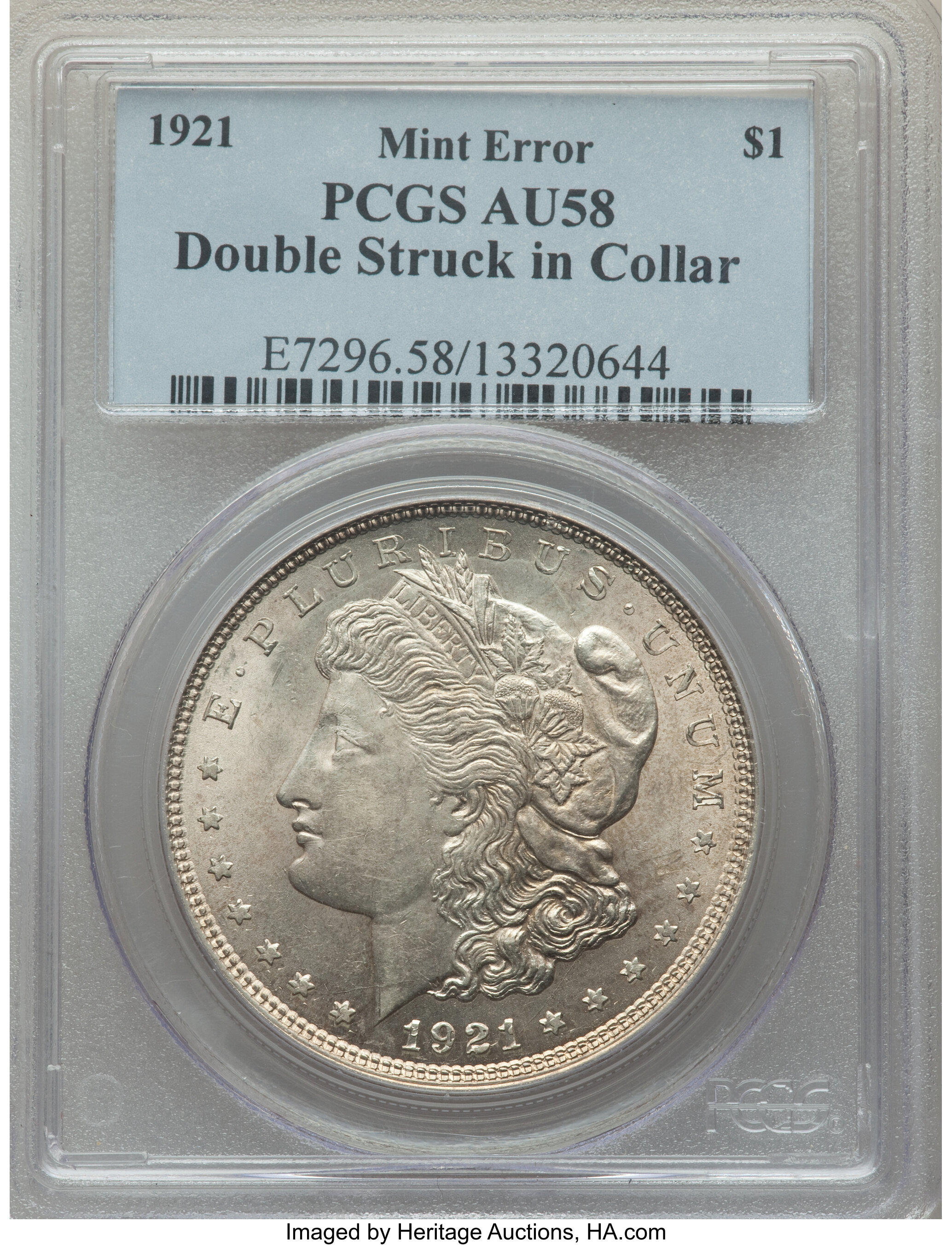 1921 $1 Morgan Dollar -- Double Struck in Collar -- AU58 PCGS. The