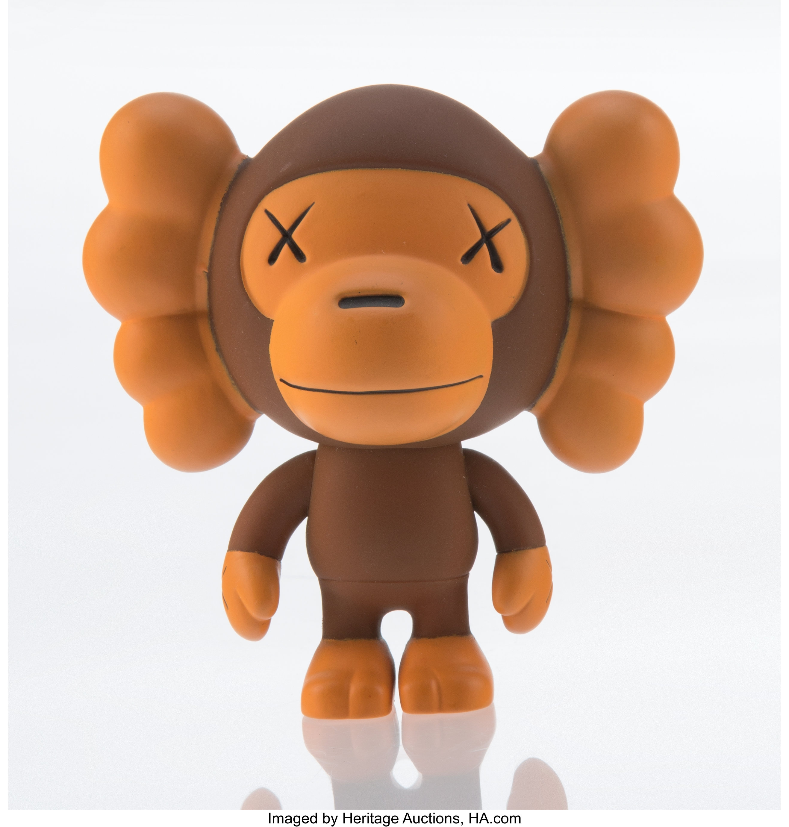 KAWS X BAPE. Baby Milo (Brown), 2005. Painted cast vinyl. 3-3/4 x