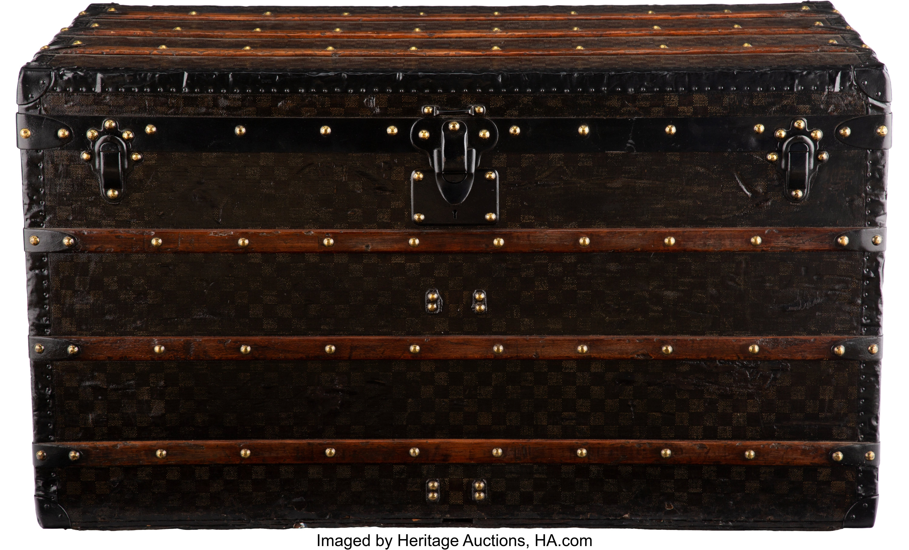 At Auction: Louis Vuitton, LOUIS VUITTON STEAMER TRUNK. AS FOUND HEAVY WEAR.