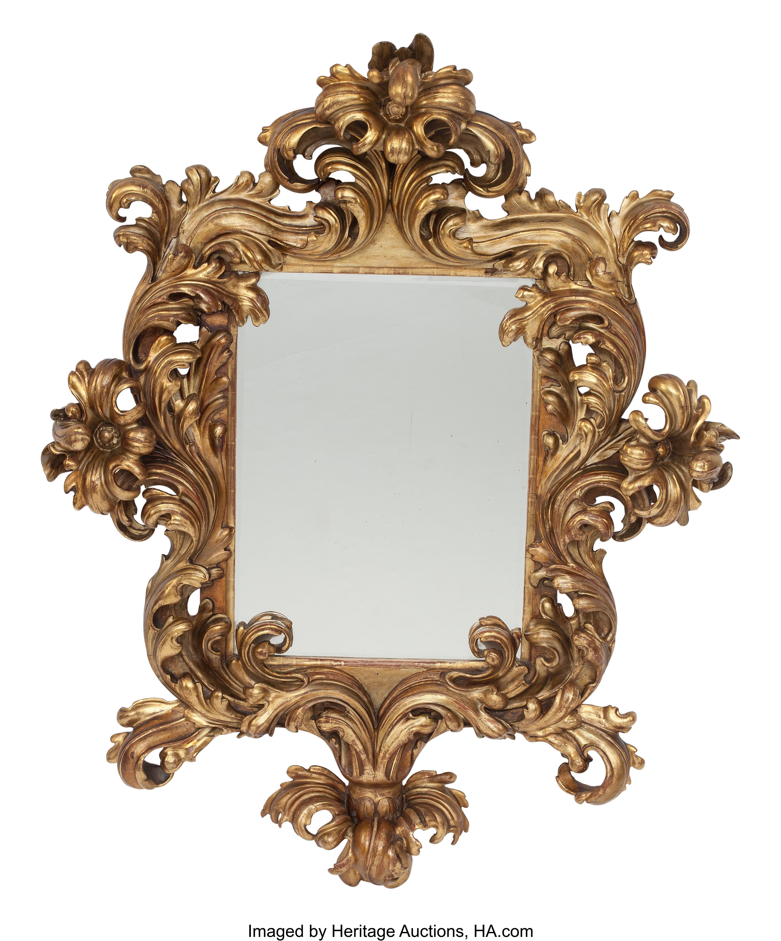 An Italian Rococo-Style Carved Gilt Wood Mirror. 65 x 51 x 11